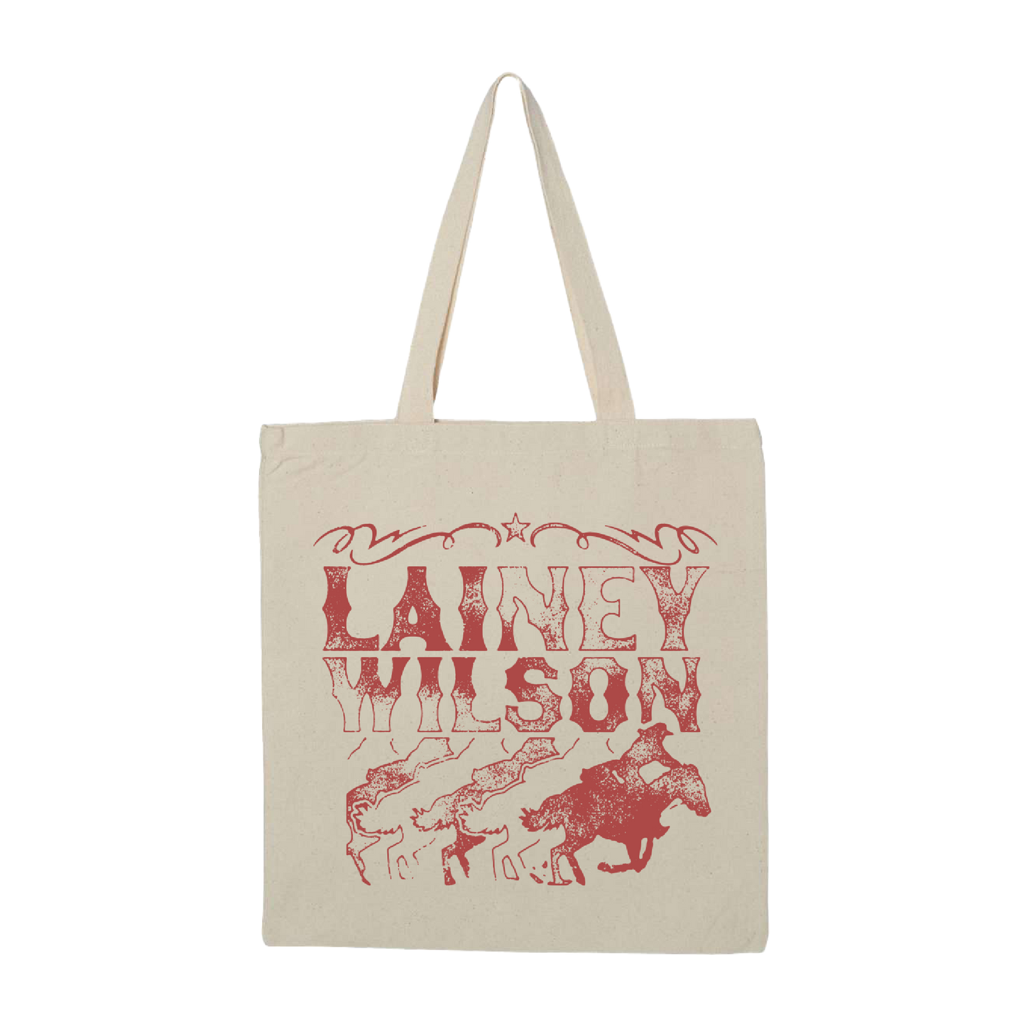 Canvas tote bag with ’Lainey Wilson’ printed in red along with cowboy imagery.