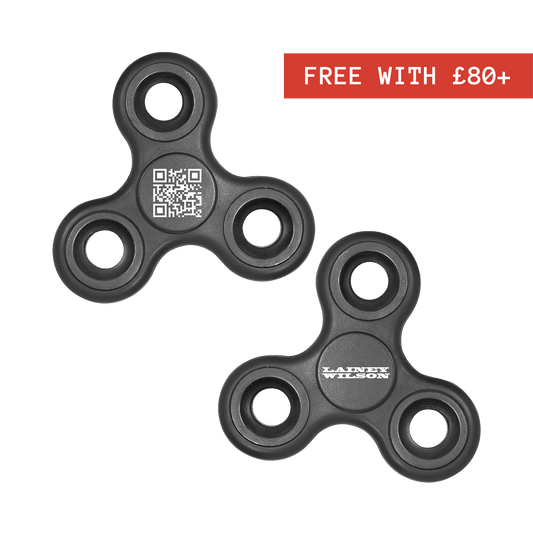 Black plastic fidget spinner with a central qr code and ’lainey wilson’ branding.