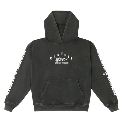 Black hoodie with white ’can’t sit still’ graphic and star-patterned sleeve trim.