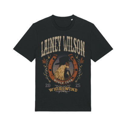 Black cotton t-shirt featuring a vintage-style graphic of lainey wilson in a hat, framed by an ornate horseshoe design with ’world tour 2025 whirlwind’ text.