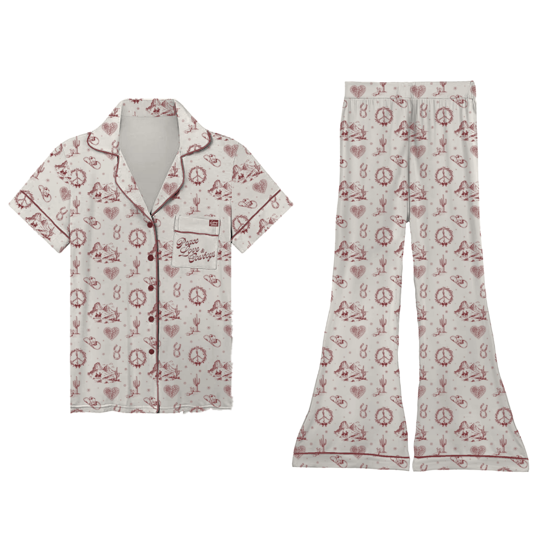 Cream-colored cowboys pyjama set with red and white peace signs hearts cacti and cowboy hats pattern inspired by lainey wilson