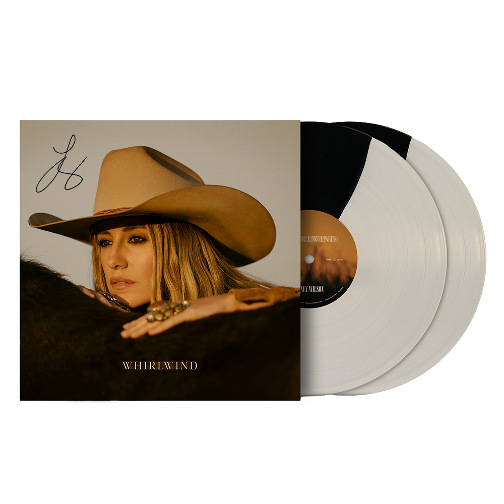 Signed beige cowboy hat-wearing woman on album cover with two white and black vinyl records.
