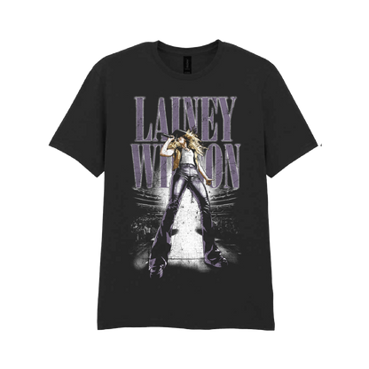 Black cotton t-shirt featuring a graphic of lainey wilson performing on stage with the text ’lainery wilson’ in stylized purple lettering above her.