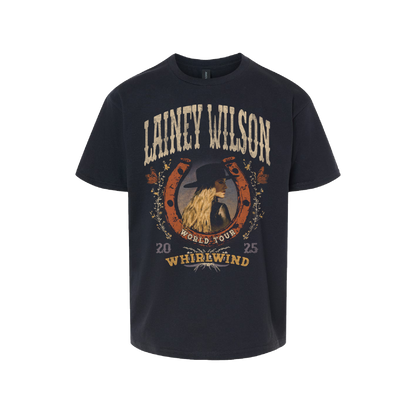 Dark navy blue cotton t-shirt featuring a vintage-style graphic of lainey wilson in a hat, framed by an orange horseshoe and floral details with ’world tour 2025 whirlwind’ text.